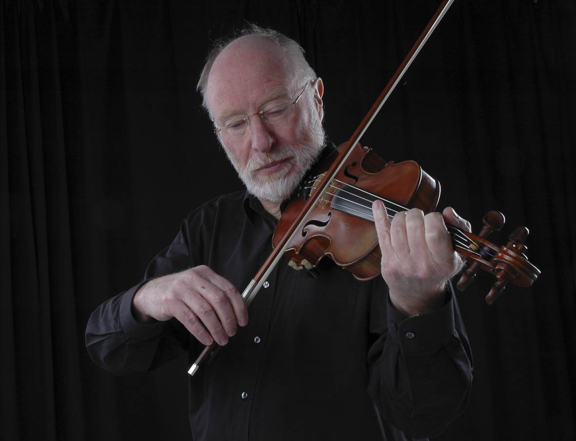 Image of Mike playing violin.